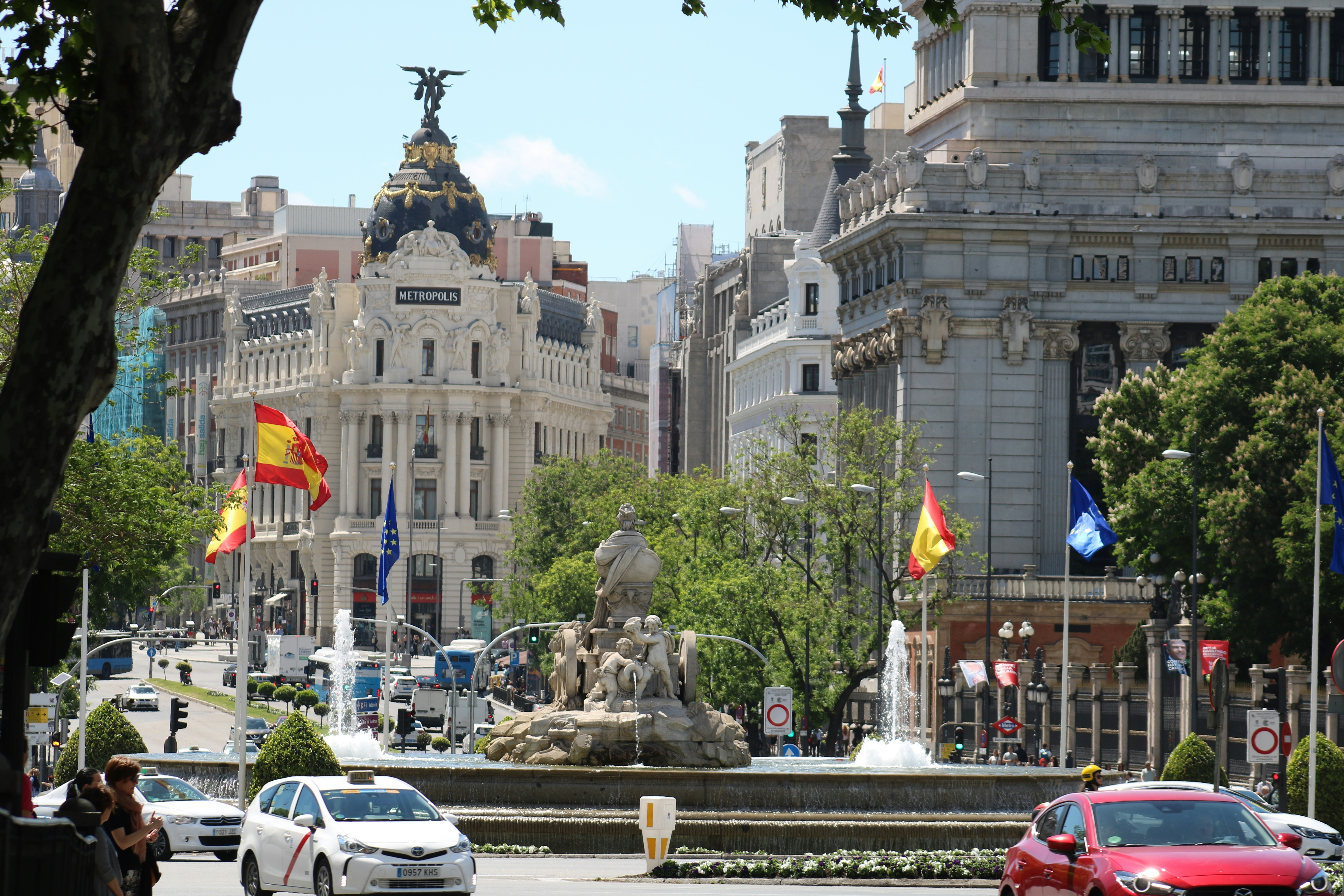 street of spain with tax building and spanish flags